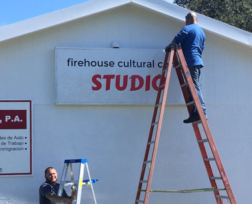 Hanging the new studio sign