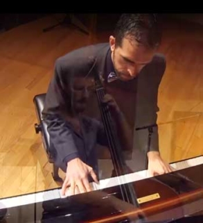 Photo of Zach Bartholomew at the piano.