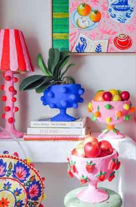 Room with handmade whimsical, colorful objects.