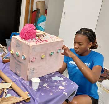 Camper busy on an art project